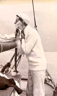 Image of man shaving on the deck of a yacht